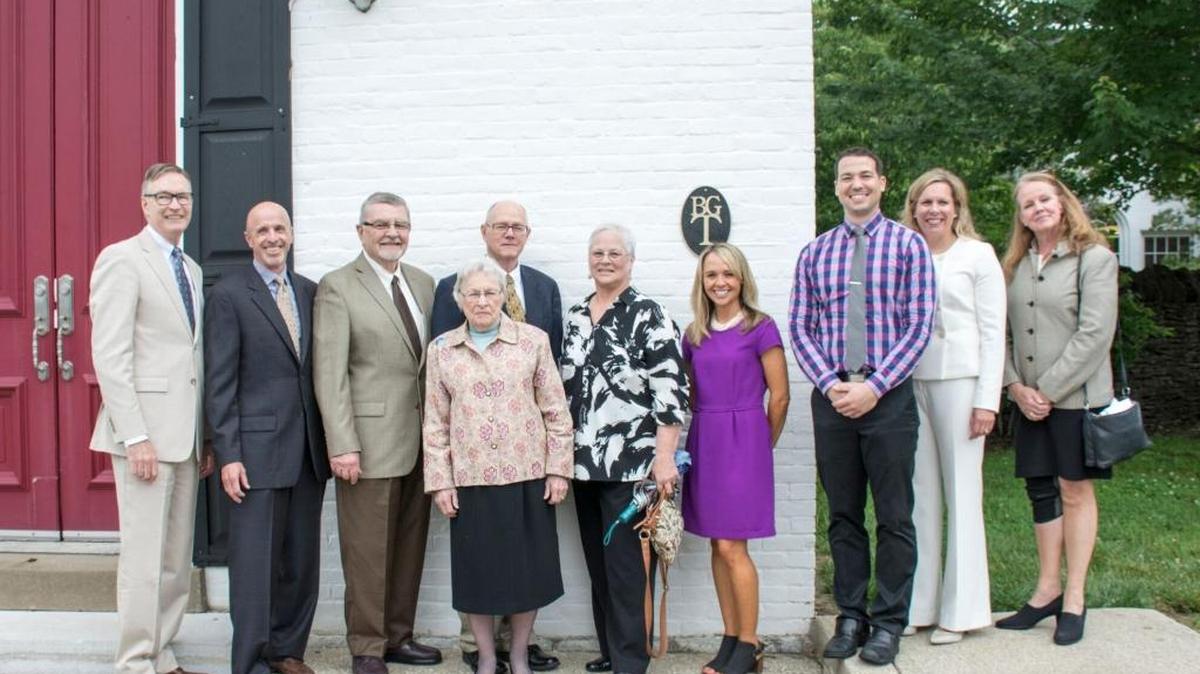 Current and former pastors of Lexington’s South Elkhorn Christian Church joined other dignitaries to celebrate the 250th anniversary of the founding of the congregation, with the dedication of a Bluegrass Trust plaque unveiled May 21 on the exterior of the church’s historic sanctuary, built in 1870. From left, Bill McDonald, Jerry Shepard, Bob Bradley, Evelyn Cartmill, Mickey Anders, Jan Ehrmantraut, associate pastor Holly Fuqua, pastor Michael Swartzentruber, 10th District Council Rep. Amanda Bledsoe, and Blue Grass Trust executive director Sheila Ferrell.