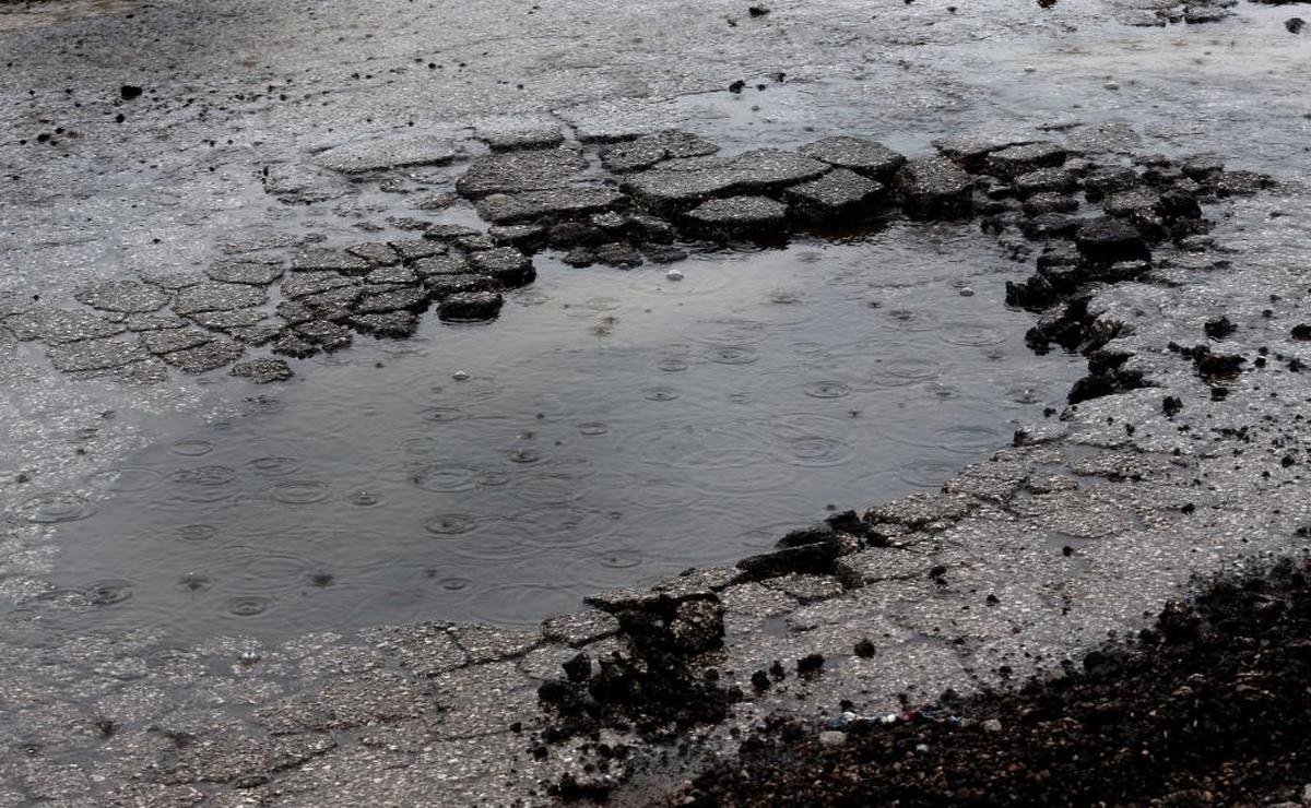 A large pothole along the 1100 block of Industry Road in Lexington is shown in this file photo.