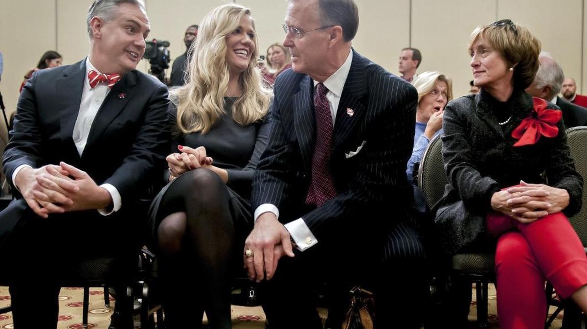 From left to right, Western Kentucky University’s incoming president Timothy C. Caboni, his wife Kacy Schmidt Caboni, current president Gary Ransdell and his wife Julie Ransdell talk Friday, Jan. 27, 2017, during an announcement in Bowling Green, Ky. WKU’s Board of Regents has chosen Caboni from the University of Kansas to become Western’s 10th president this summer.