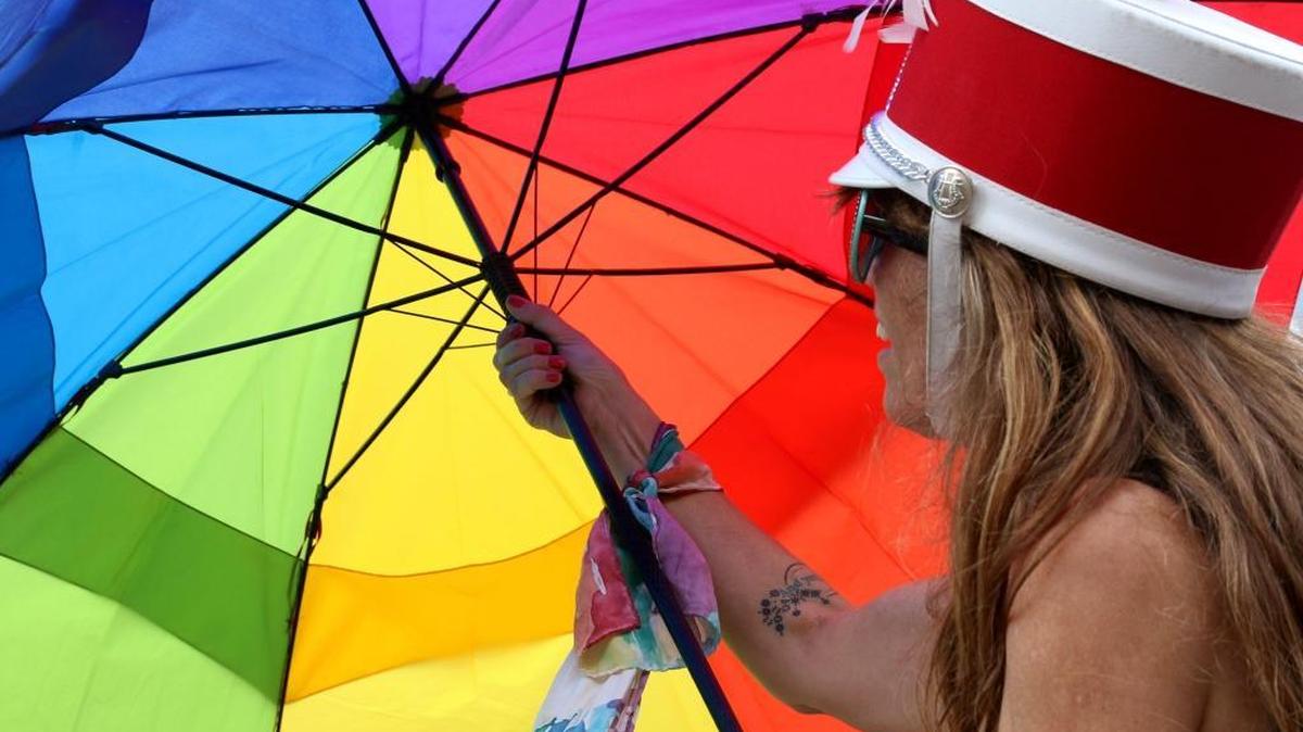 Lorie Houlihan twirled an umbrella as she showed her support for the Supreme Court gay marriage decision at the eighth annual Lexington Pride Festival in 2015.