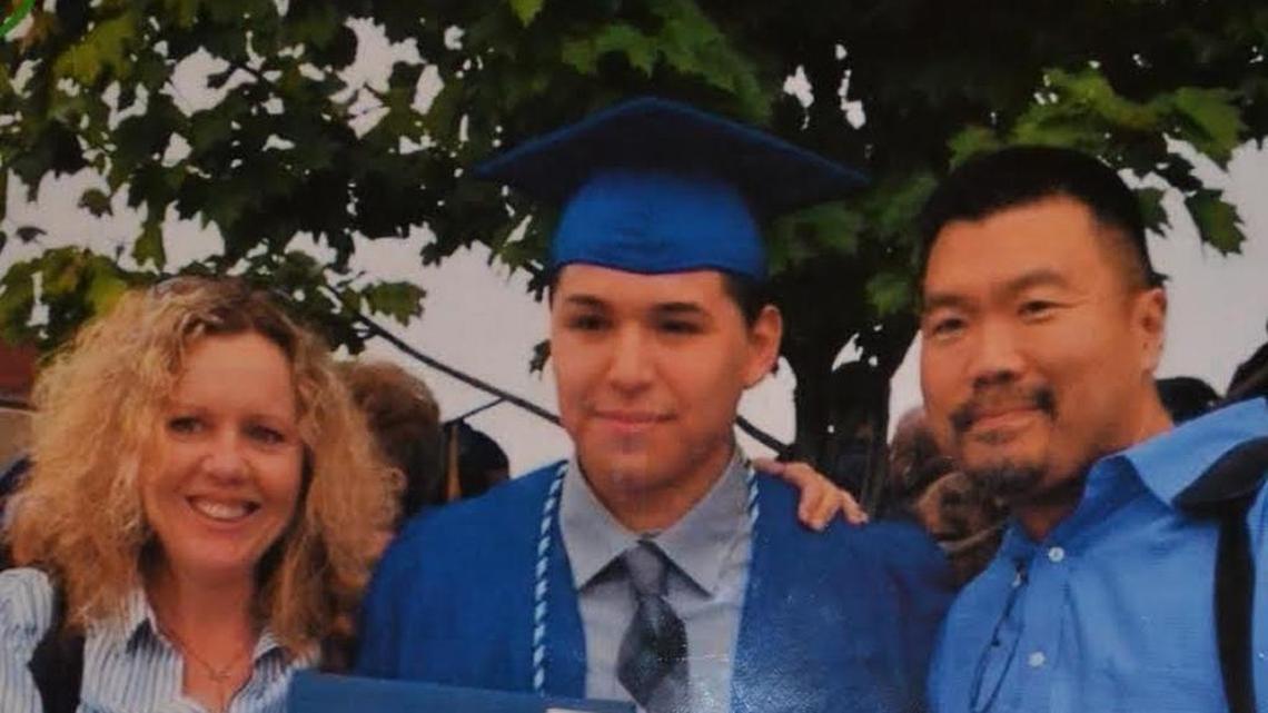 From left, English teacher Elise Crisp, Andres Soto Jr. and Principal Ronald Chi at Soto’s graduation in 2013. Crisp held the diploma because Soto told his teachers that the it belonged to all of them, not just him.