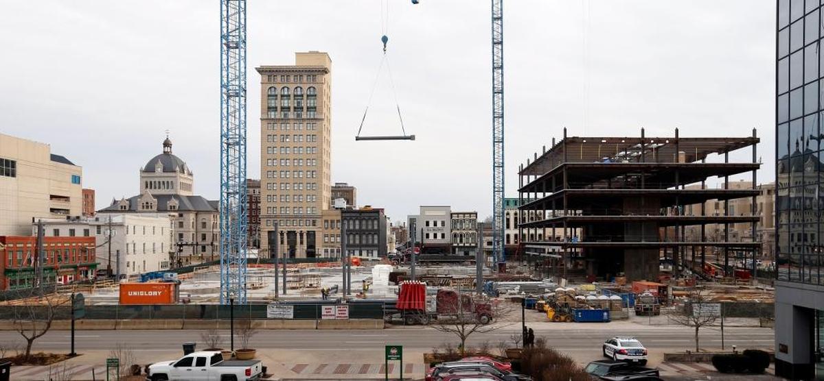 Construction continued on CentrePointe project on West Vine Street and Upper Street. Plans for the development include the office tower with condominium penthouses, a 120-room extended-stay Residence Inn with a rooftop bar, a 230-room Marriott hotel, a Jeff Ruby’s Steakhouse, and a 700-space underground parking garage.