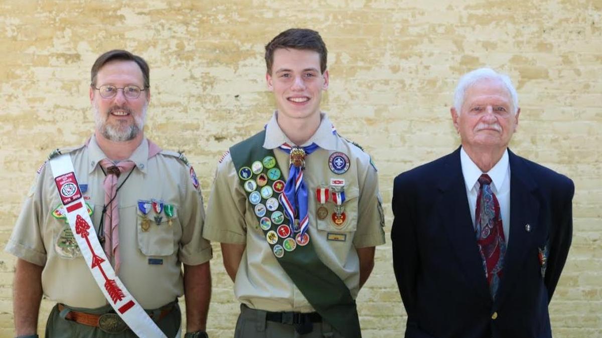 David Carruthers, center, is a fourth generation Eagle Scout. Three living generations of Eagle Scouts attended his Court of Honor on June 10. David’s grandfather, right, Thomas Carruthers, of Murray, earned his Eagle Scout rank in 1950. David’s father, J.D. Carruthers, left, earned his in 1978. His great-grandfather, the late David H. Lyons Carruthers, became an Eagle Scout in 1923.