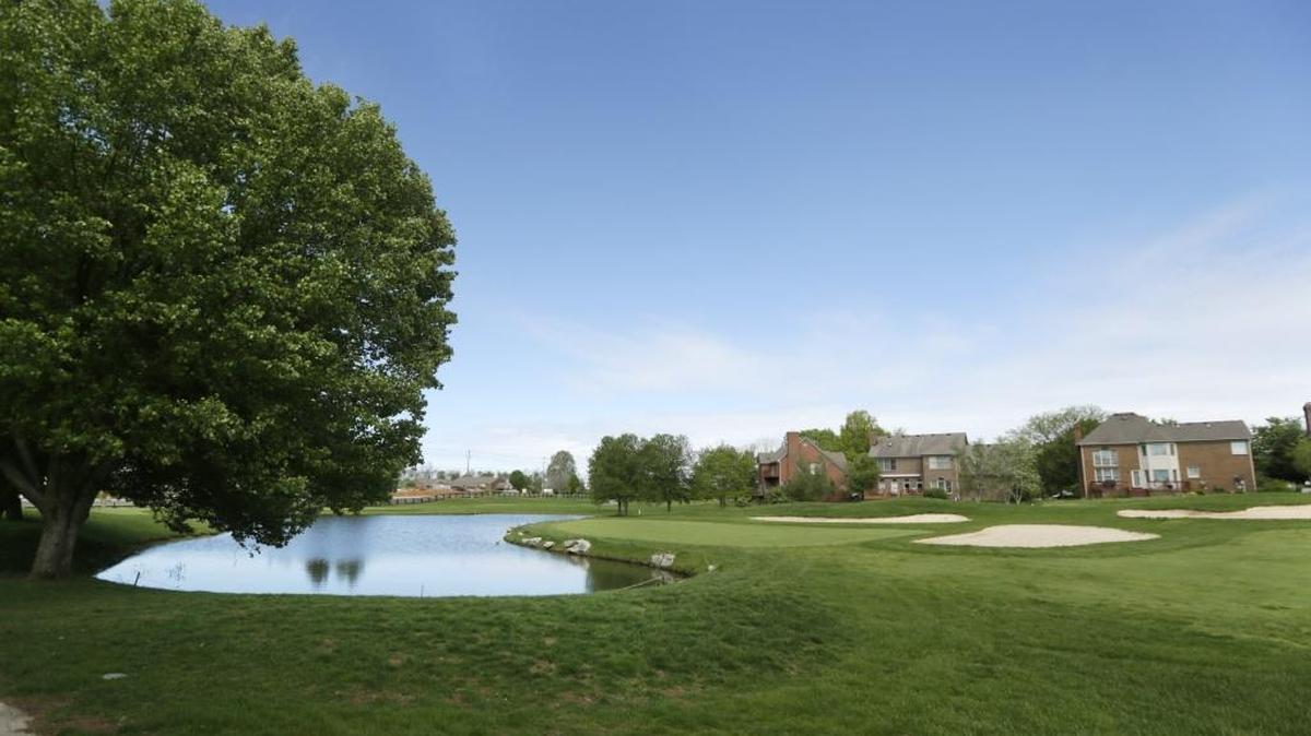 Houses near the ninth green at Andover Golf and Country Club in Lexington. The golf course, which closed in February, was sold Monday for $2.95 million to its mortgage holder, Whitaker Bank.