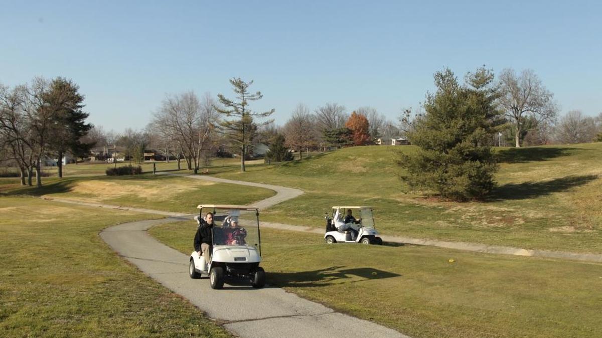 Players drove golf carts at Tates Creek Golf Course in Lexington on Nov. 28, 2012.