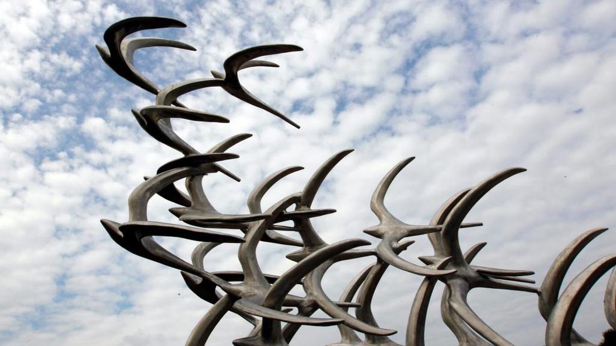The 5191 memorial sculpture at The Arboretum, State Botanical Garden of Kentucky, on Alumni Dr. in Lexington, Ky., Monday, August, 27, 2012. The memorial sculpture was created by artist Douwe Blumberg. Comair Flight 5191 crashed on the morning of August 27, 2006, killing all 47 passengers and 2 of the 3 flight crew members.