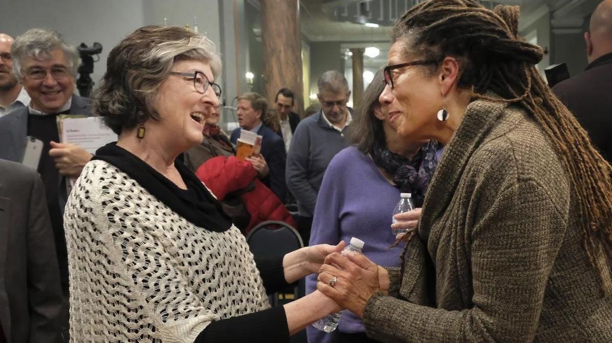 Novelist Barbara Kingsolver, left, talked with poet Nikki Finney at the Kentucky Writers Hall of Fame ceremony in February at the Carnegie Center for Literacy and Learning. Kingsolver was inducted into the Hall of Fame, and Finney read from the work of another inductee, Gayl Jones.