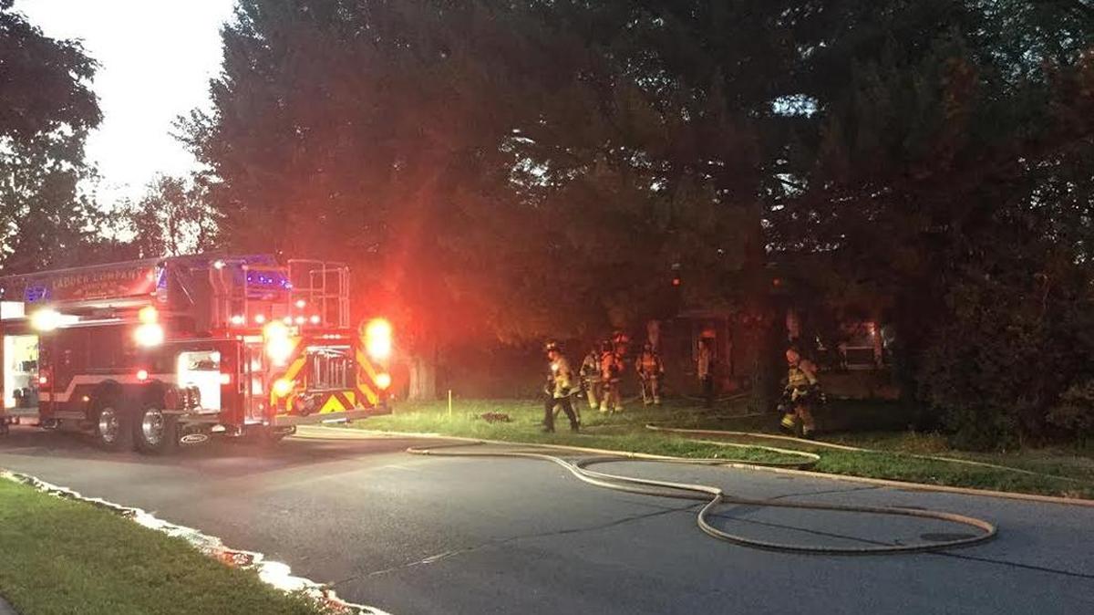 Lexington firefighters at the scene of a structure fire on Holly Springs Drive on Thursday night.