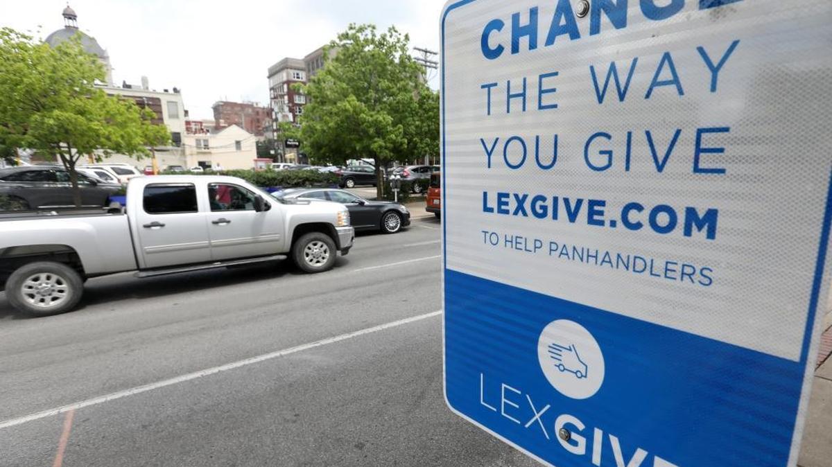The city of Lexington has placed signs at 46 intersections encouraging people to give to Lexgive.com and not to panhandlers.