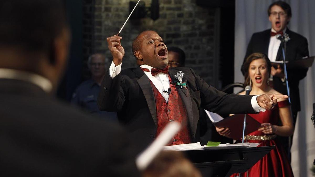 Dr. Everett McCorvey conducts during the Alltech Celebration of Song, featuring the talents of the UK Opera Theatre, at The Square in Lexington on Sunday.