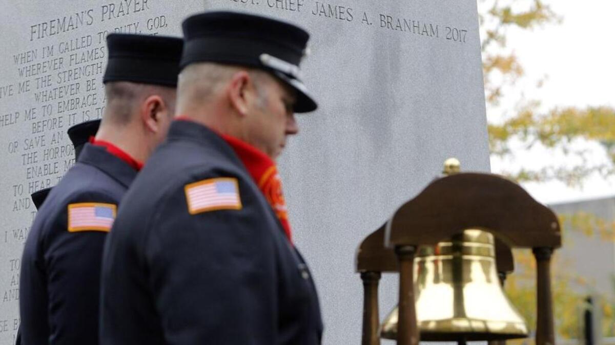 There was a moment of silence as the names of firefighters Matthew Logsdon, Joseph Vissing and Asst. Chief James Branham were added to the Fallen Firefighters Monument Saturday at Phoenix Park in Lexington.