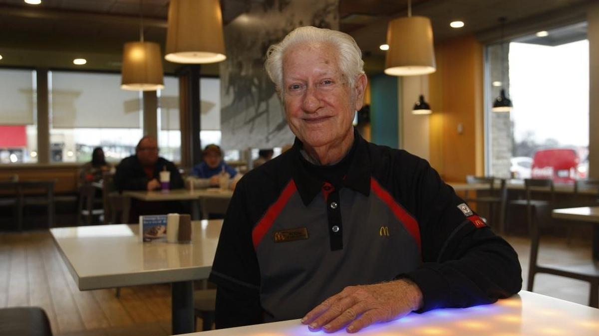 Wendall Gill, 82, who seemed to never stop working or smiling, poses for a portrait at McDonald's on Richmond Rd., where Gill has worked for 38 years, in Lexington, Ky., Tuesday, December 21, 2015.