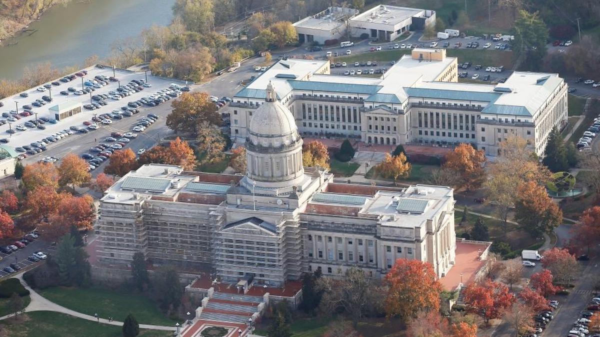 Aerial photo of the State Capitol and Capitol Annex in Frankfort Ky., Thursday, November 17, 2016. The left side of the Capitol scaffolding has set up from the ground to the top floor for a major cleaning and restoration project. of the historic limestone and granite building. The $1.1 million is expected to be completed in February. Most of the work is cleaning off the biological growth and repointing any areas where mortar has eroded.