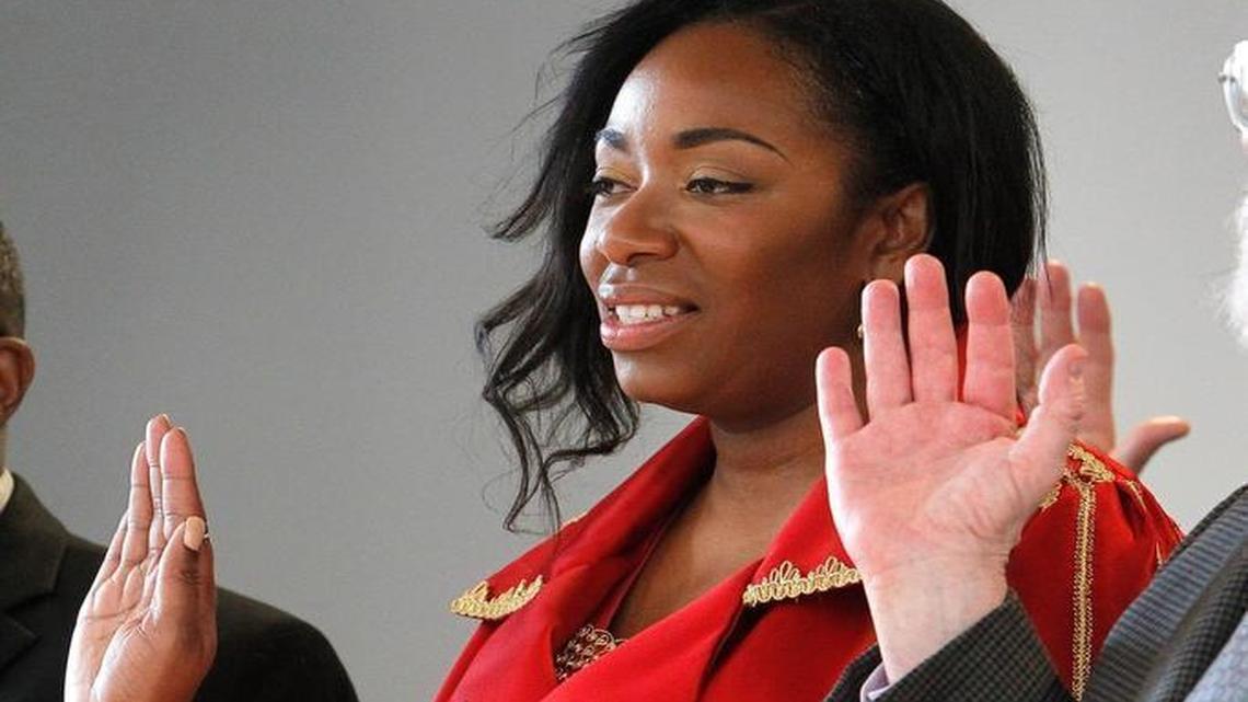 Sasha Love Higgins took the oath of office on Dec. 11 during the swearing-in for Lexington-Fayette Urban County Council members at the Lexington Senior Center.
