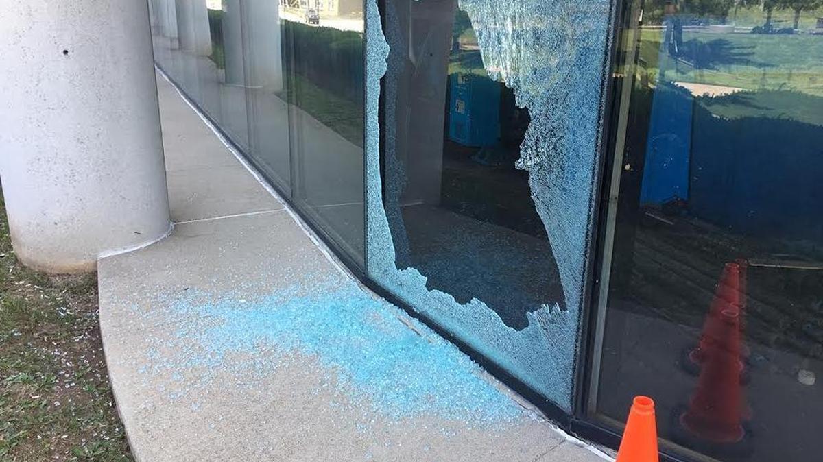 A shattered window on the first level of the Lexington Herald-Leader building on Midland Avenue.