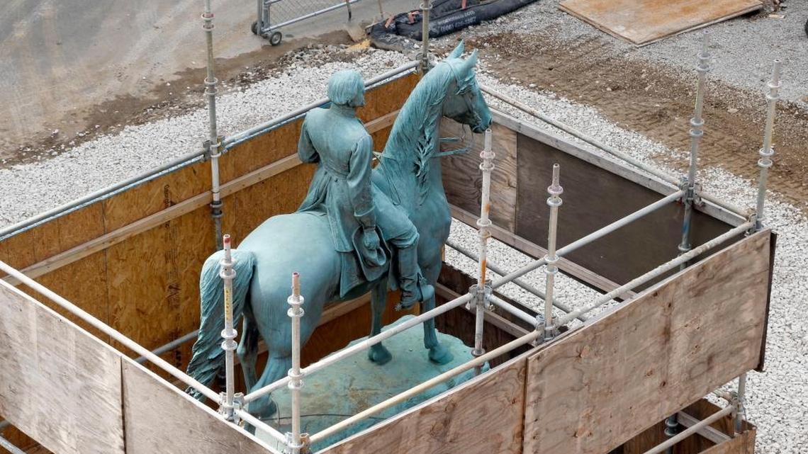 The John Hunt Morgan statue is protected from possible construction damage during renovation of the nearby former Fayette County Courthouse in downtown Lexington.