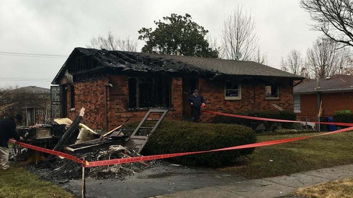 Code enforcement officials blocked off entry into a house Thursday morning. The house on Mulberry Drive caught fire overnight.