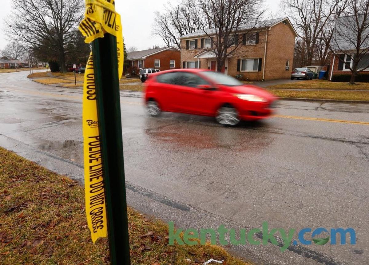Crime scene tape remained Wednesday at the scene of a fatal shooting that occurred late Tuesday in the 2100 block of Garden Springs. One juvenile died in an ambulance; another was severely injured, police said.