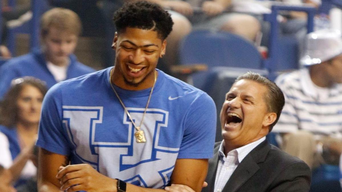 Kentucky basketball coach John Calipari, right, laughs with former Wildcat player Anthony Davis, of the New Orleans Pelicans, during last years Big Blue Madness. Which former players will attend this years’ celebration of the first basketball practice of the season?