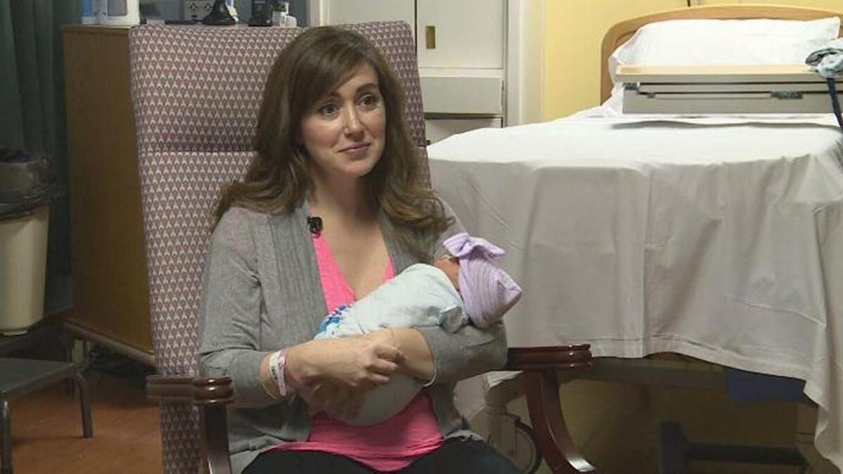 Dr. Amanda Hess held her newborn daughter.