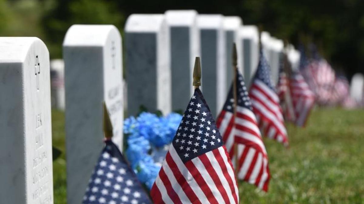 American flags were placed at graves during a Memorial Dayprogram at Camp Nelson National Cemetery.