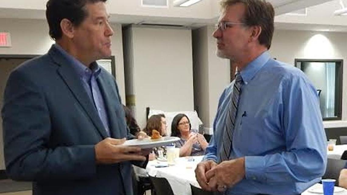 Jessamine County Public Health Director Randy Gooch, right, chatted with Jessamine County Judge Executive David West during a farewell reception. Gooch will become the Deputy Commissioner for the Kentucky Department for Public Health.
