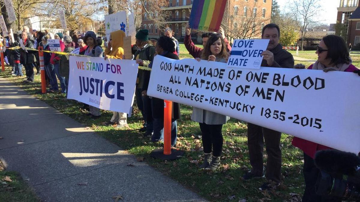 Demonstrators lined the south side of Chestnut Street in Berea to protest recent incidents of harassment directed toward students.