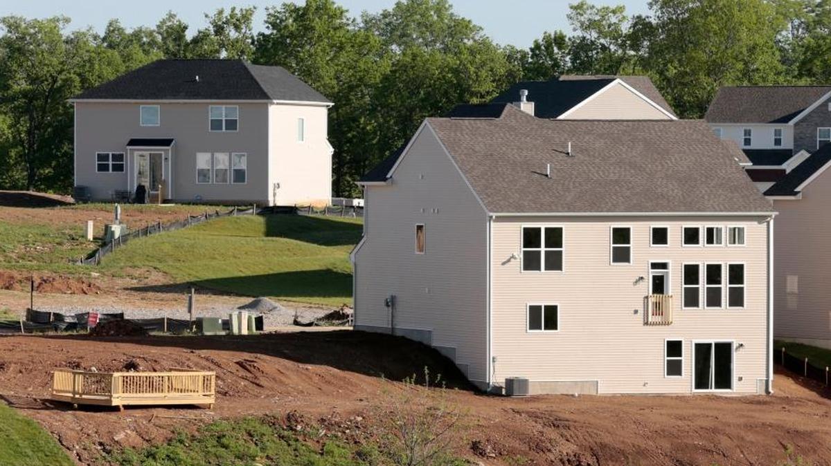 Houses being built in the Rocky Creek Farm subdivision as seen from Paris Pike (U.S. 460) in Georgetown, May 13, 2015.