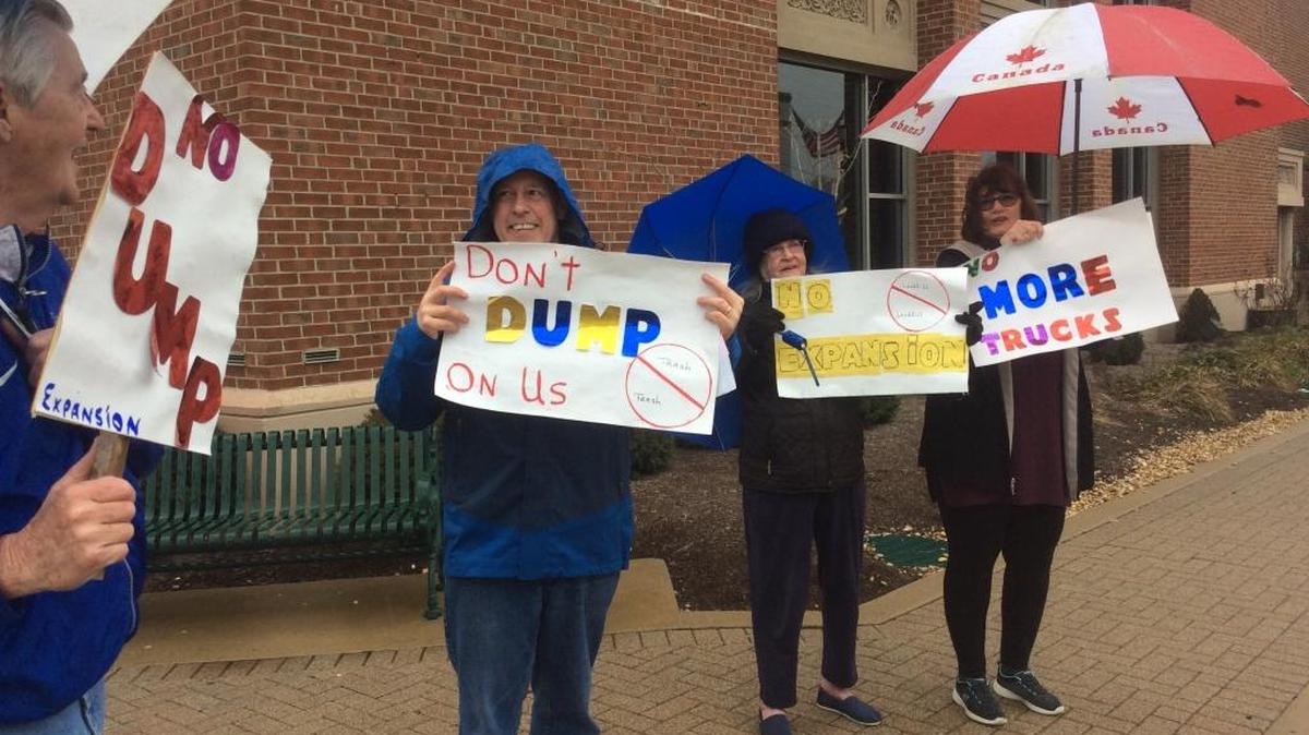 Citizens opposed to a landfill expansion protested around the Scott County Courthouse on Saturday afternoon.
