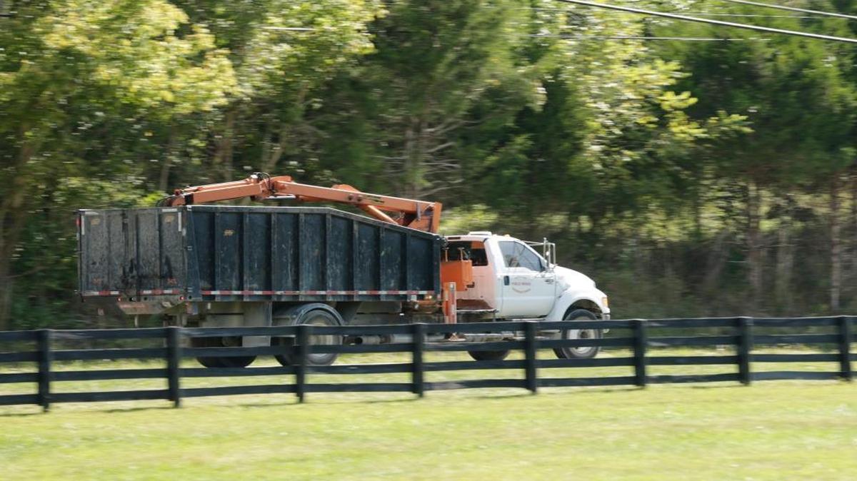 A truck drives south from the Central Kentucky Landfill in late 2016. The Central Kentucky Landfill has been the center of an ongoing controversy.