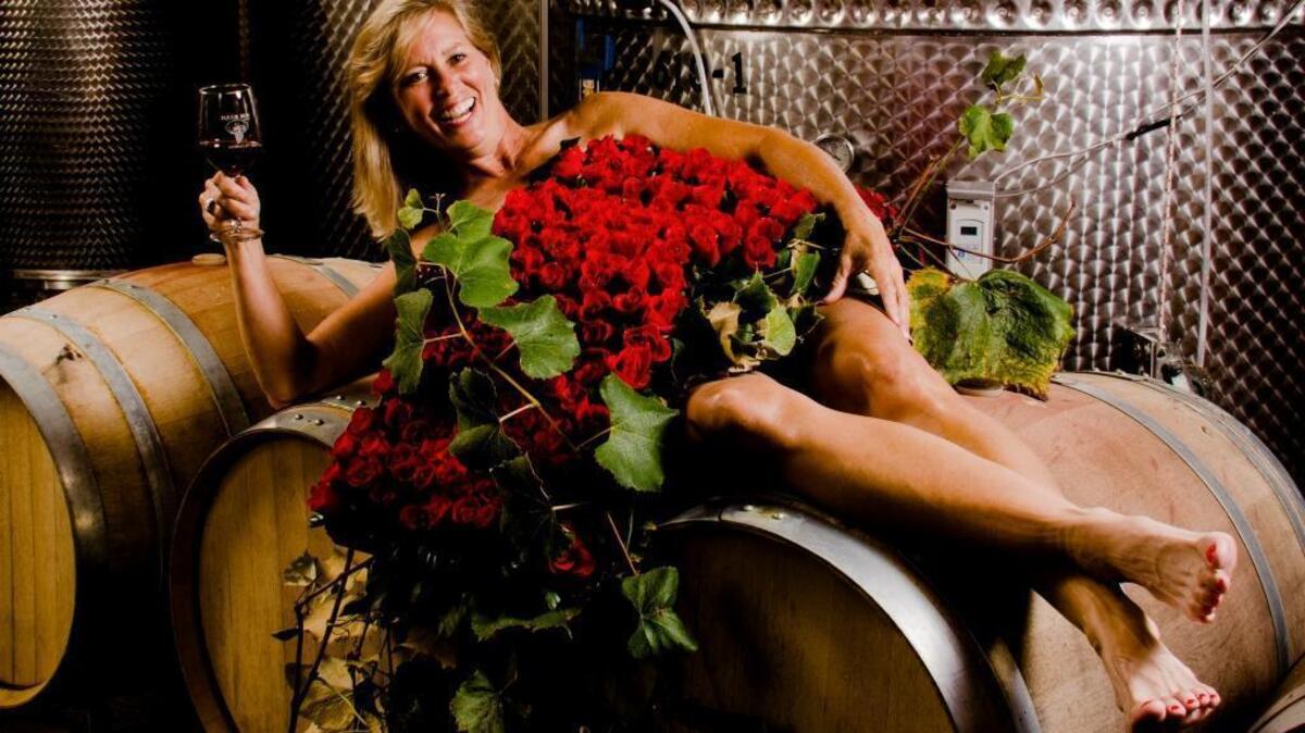 Cynthia Bohn, owner of Equus Run Vineyards near Midway, is among the subjects depicted in the “Women of Woodford” calendar now on sale to raise money for Woodford Theatre.