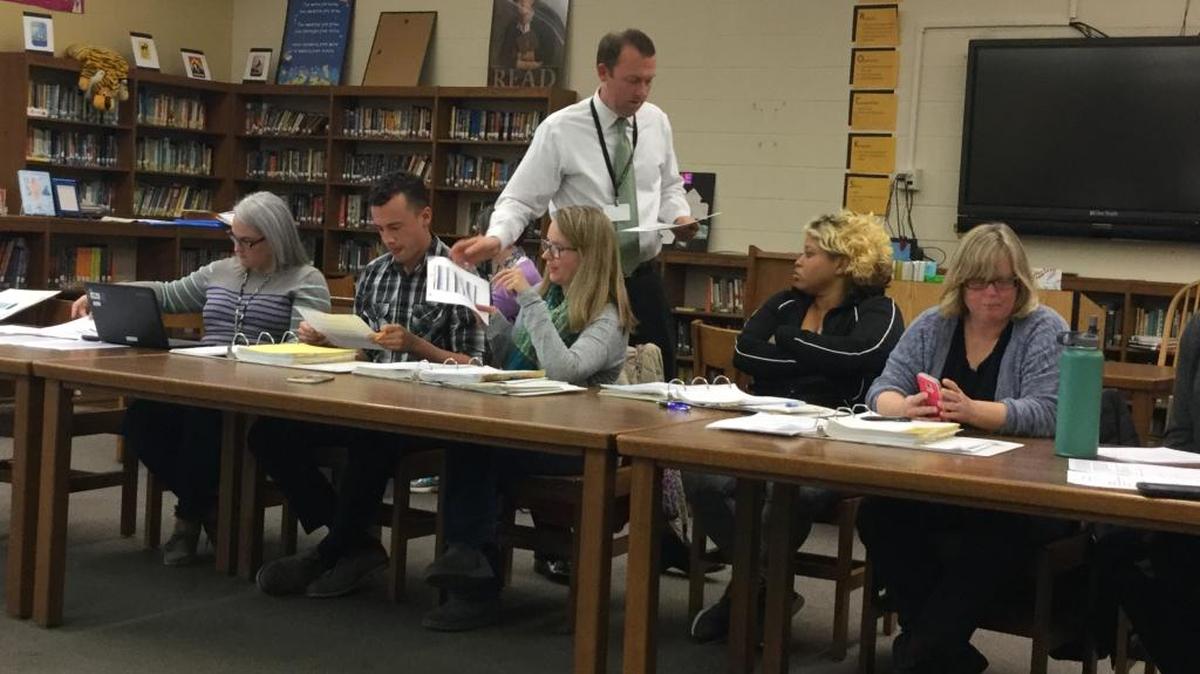 The Woodford County Middle School decision-making council met Monday to discuss several agenda items. From left to right are guidance counselor Kelly Sayre, teacher J.J. Viera, teacher Janet Bauer, Principal Tracy Bruno (standing), parent Lori Reed, and parent Amy Patterson. Council members Jill Smith and Sharon Ohler are not shown.