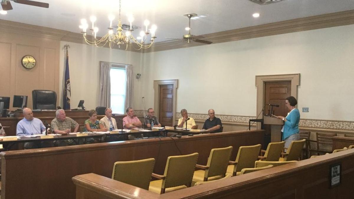 Dottie Cordray, standing, spoke to the Versailles-Midway-Woodford County Planning Commission during a Thursday night hearing.