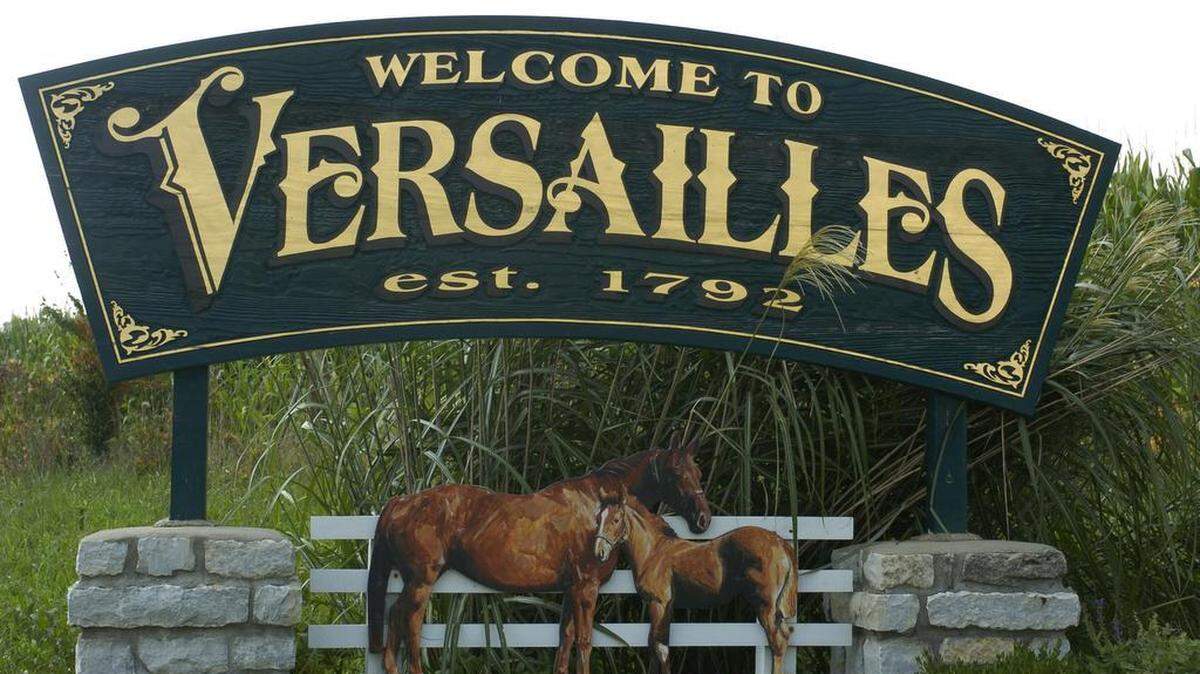 File photo of a Versailles entrance sign.