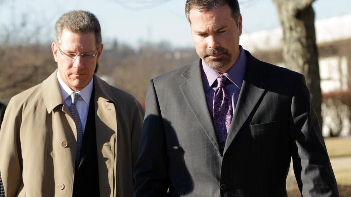 Richie Farmer, right, and lawyer Guthrie True left U.S. District Court after sentencing in Frankfort on Jan. 14, 2014. Farmer was sentenced to 27 months in prison after pleading guilty to misusing state resources during his tenure as Kentucky’s agriculture commissioner.