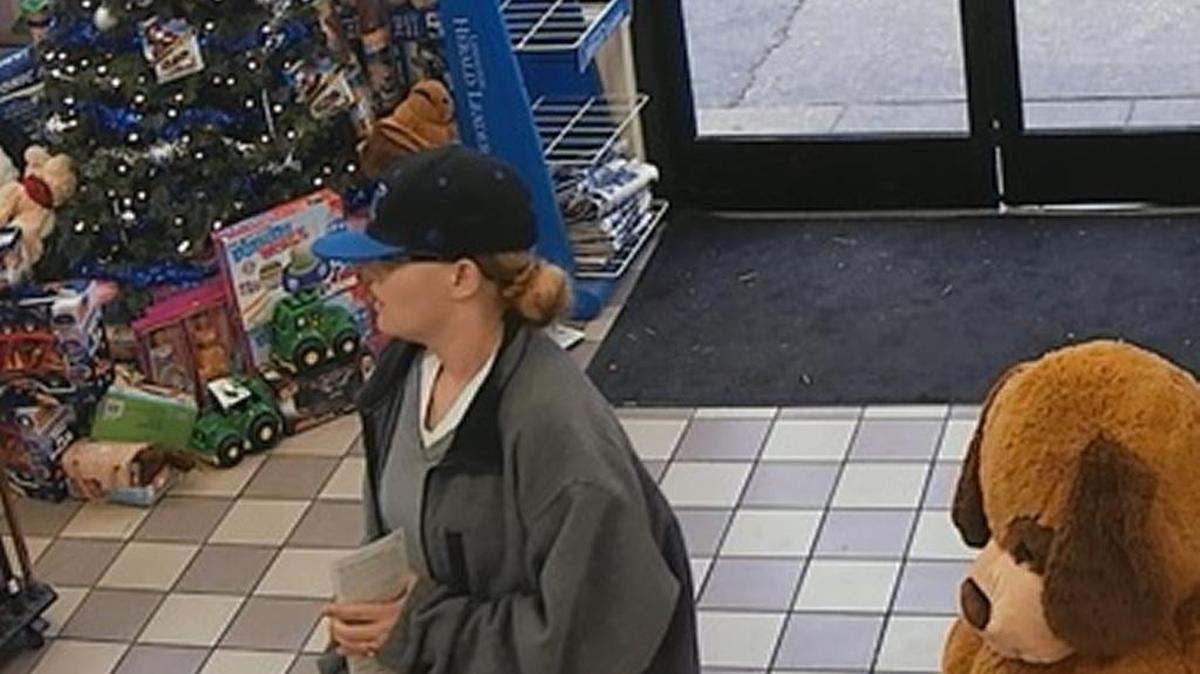 This woman was involved in cashing stolen lottery tickets, police say.