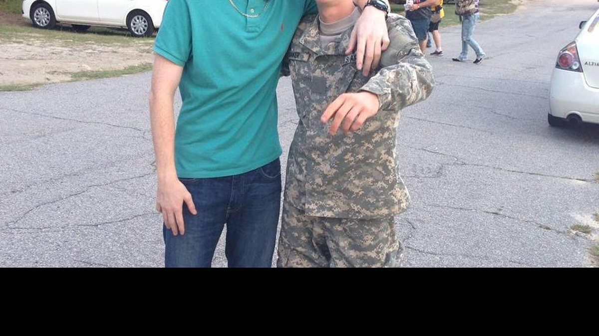 Caleb Hallett posted this picture on his Facebook page in August. He’s on the left with friend Josh Baker.