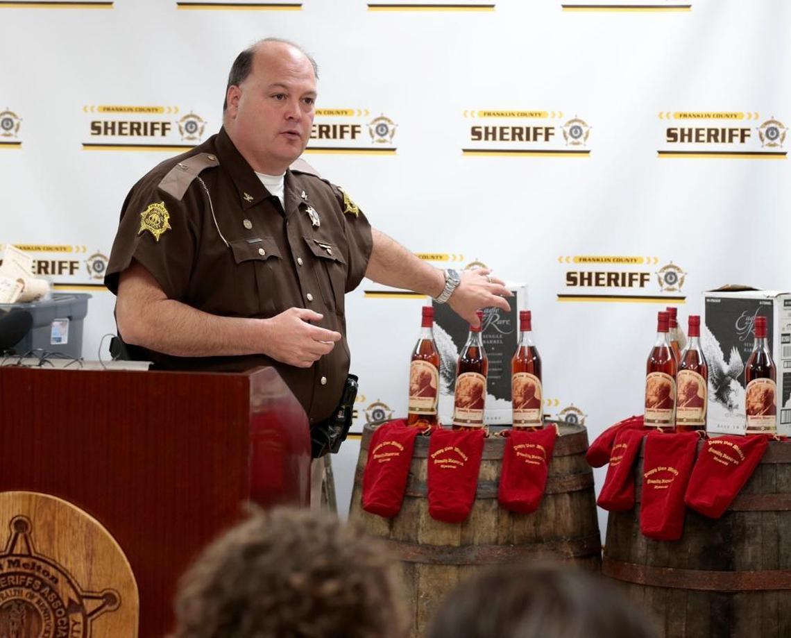 Franklin County Sheriff Pat Melton, with bottles of recovered Pappy Van Winkle’s Family Reserve 20-year-old bourbon in the background, talked about indictments in a whiskey theft ring during an April 2015 news conference.The theft targeted the Buffalo Trace and Wild Turkey distilleries and included Pappy Van Winkle bourbon.