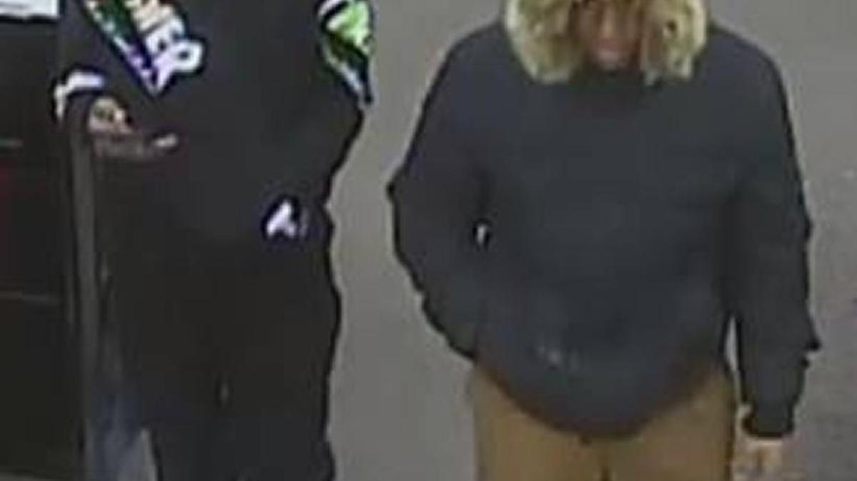 This image, from a surveillance camera, is of two of three man suspected of robbing the Kroger store on Boston Road last week.