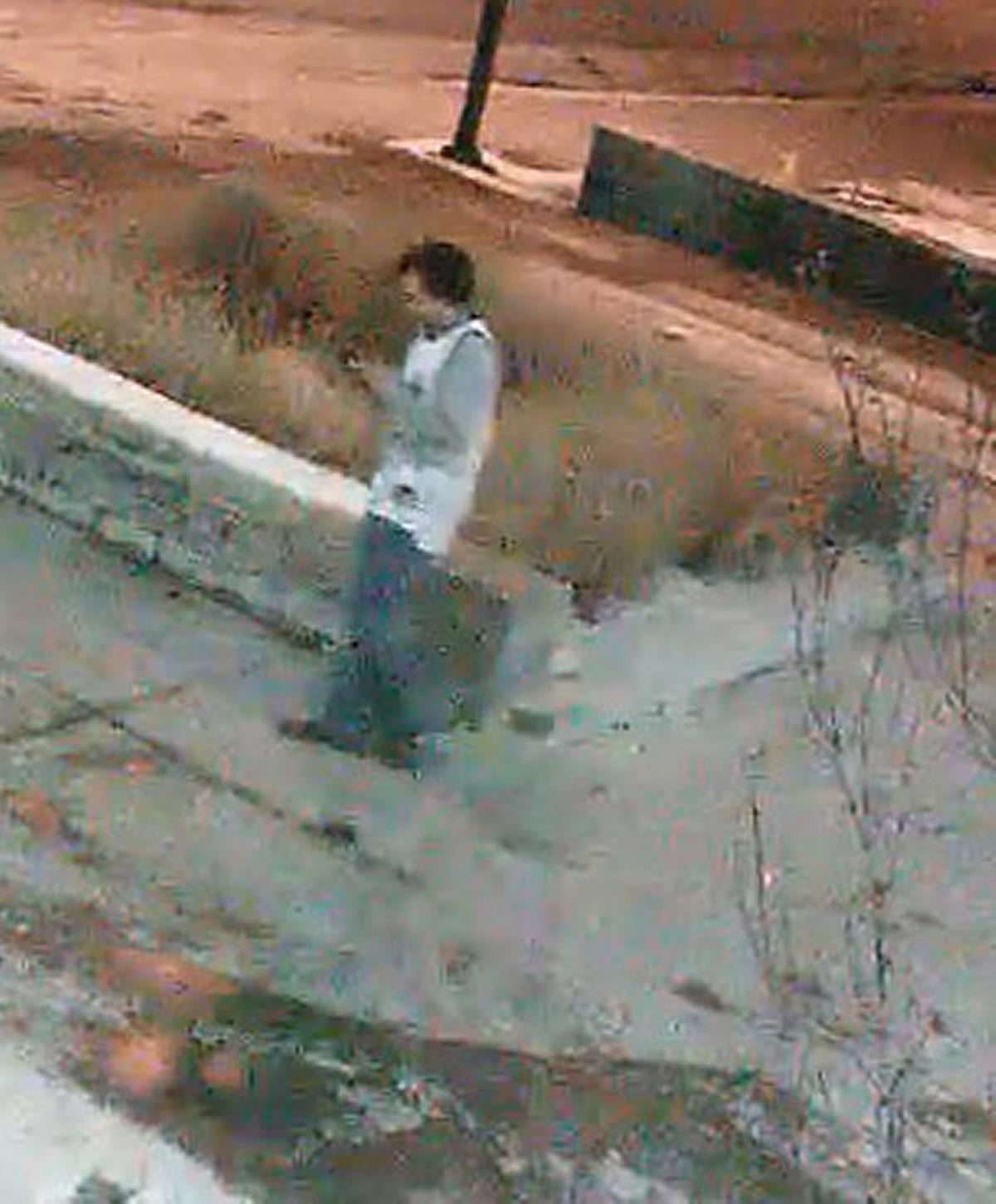 Police are searching for this man who vandalized a sign in front of the Chabad of the Bluegrass last month, along with four or five other men.