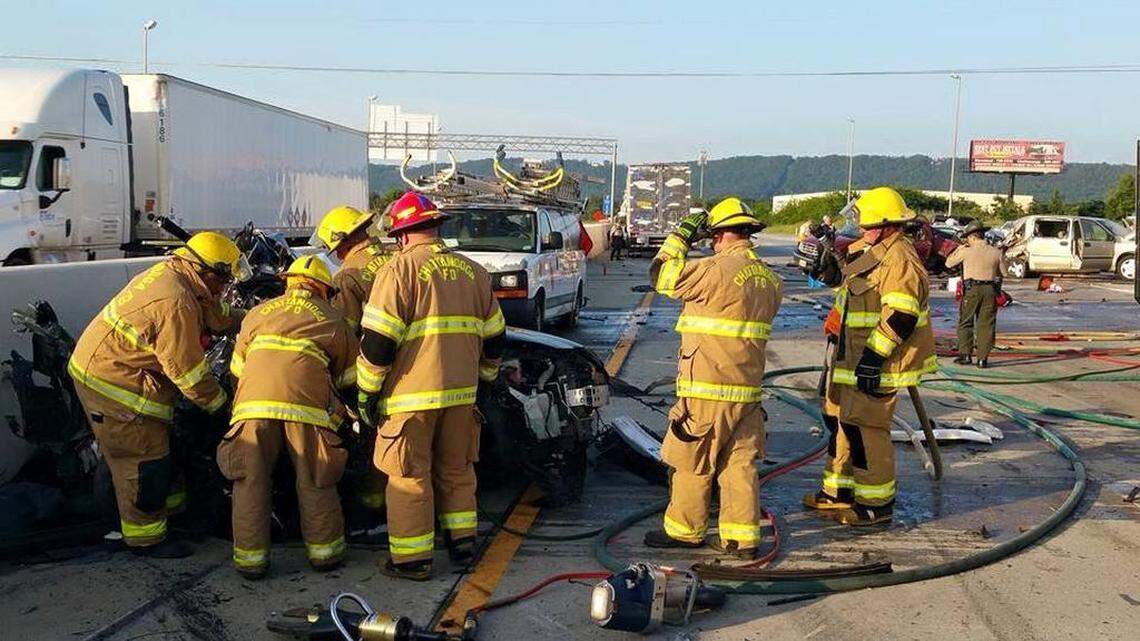 Firefighters worked at the scene of a devastating crash in June 2015 on Interstate 75 near Chattanooga that killed six people. A 2007 Peterbilt tractor-trailer plowed into several cars. The National Transportation Safety Board released a report Tuesday saying that the truck driver probably had been awake for 40 hours and had used meth before the crash.