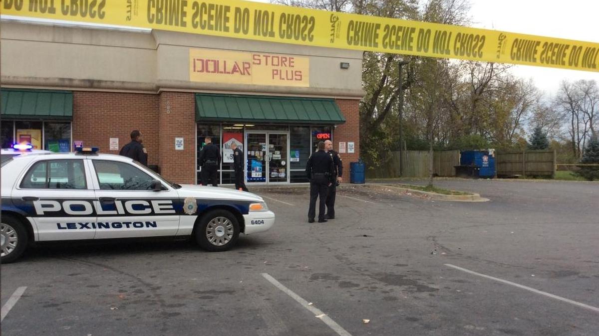 Police investigated after a man was found with two gunshot wounds to the back in the parking lot outside Dollar Store Plus on Lima Drive Tuesday.