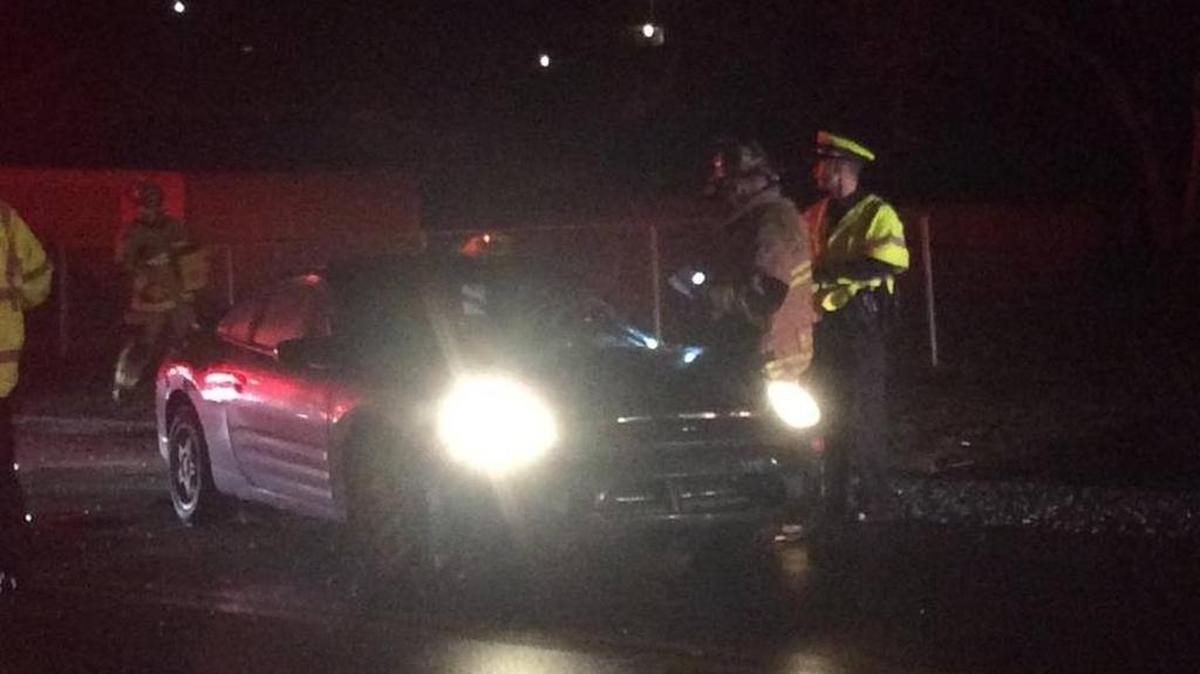 Police investigated the scene of a collision on Woodhill Drive near Mulberry Drive, which they thought might be related to a shooting Thursday night at Woodhill Park. The shooting victim, Christian Gomez, 19, died later Thursday night.