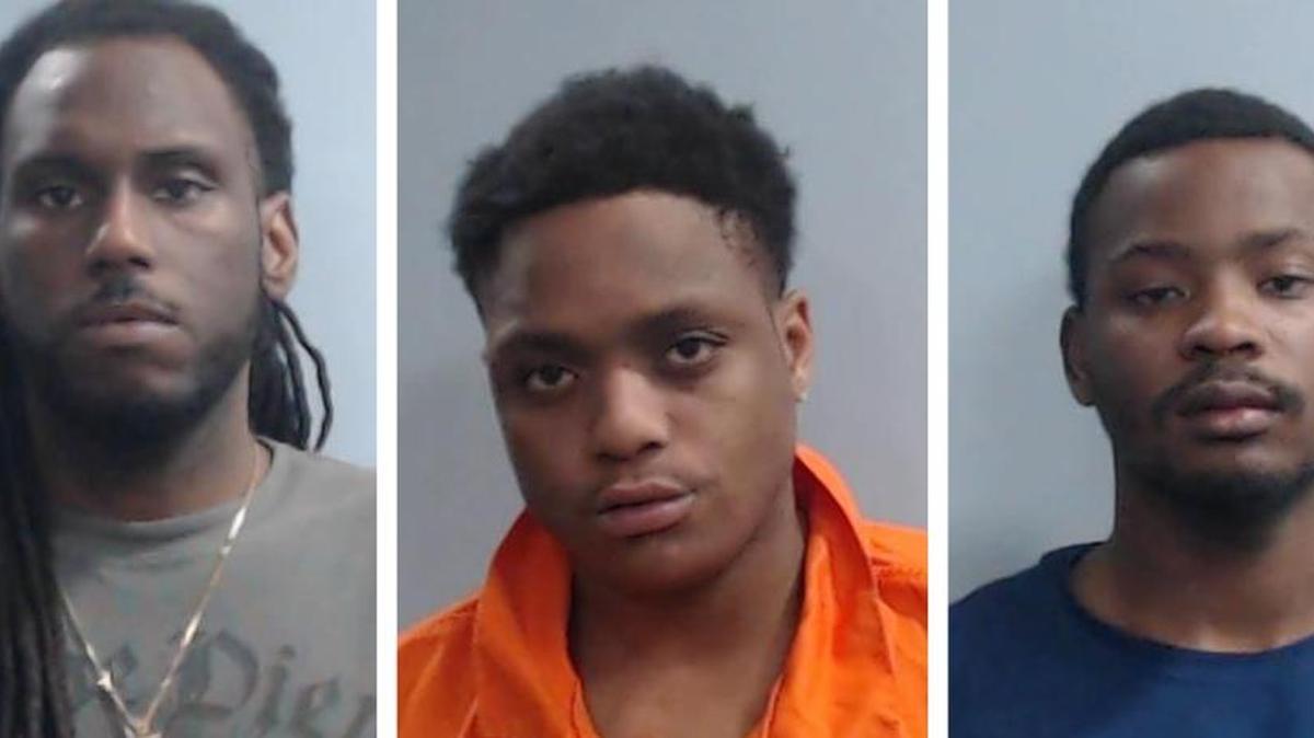 From left, John Harris, Jacque Jones and John Harris.