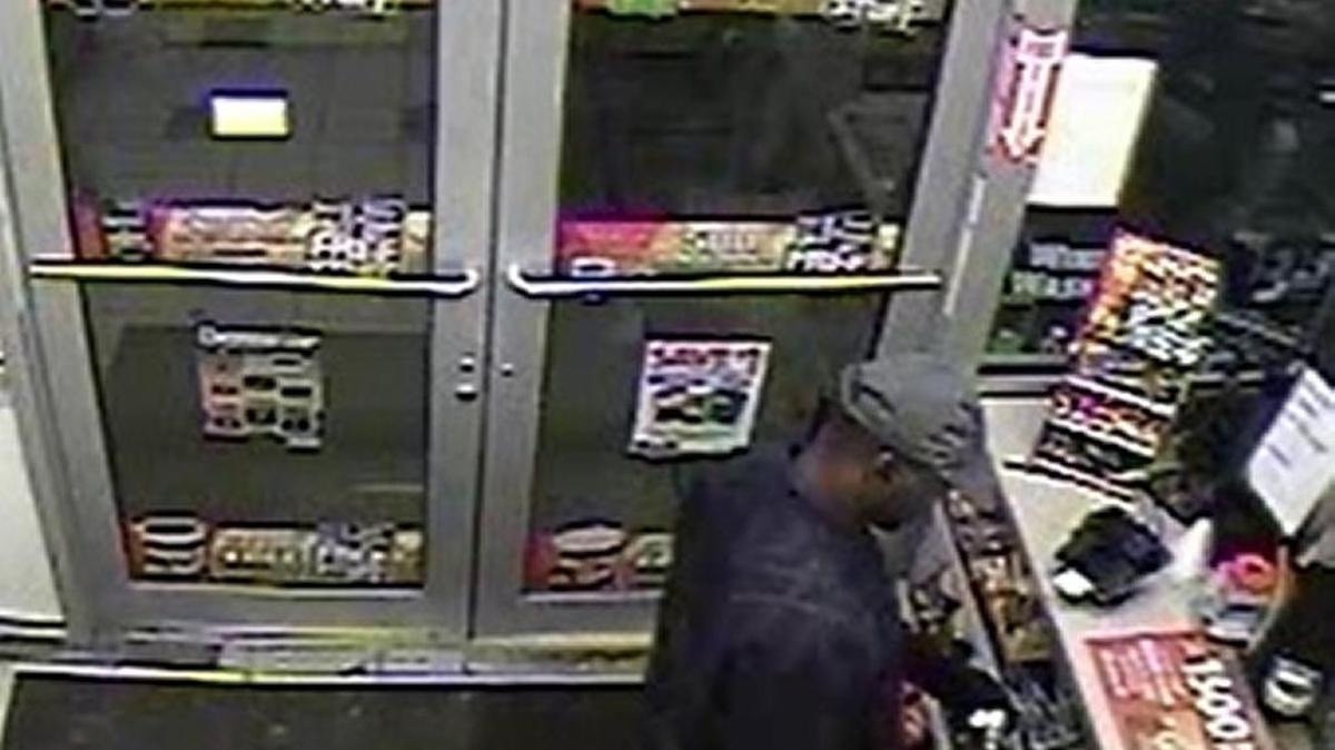 This image from surveillance video shows the robbery of the Speedway at 2301 Paris Pike early Dec. 7.