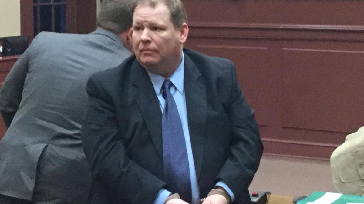 Kenneth Allen Keith, the former Pulaski County preacher accused of murder in the shooting deaths of three people at a Danville pawn shop, turned to say goodbye to his wife after a Monday hearing in Boyle Circuit Court.
