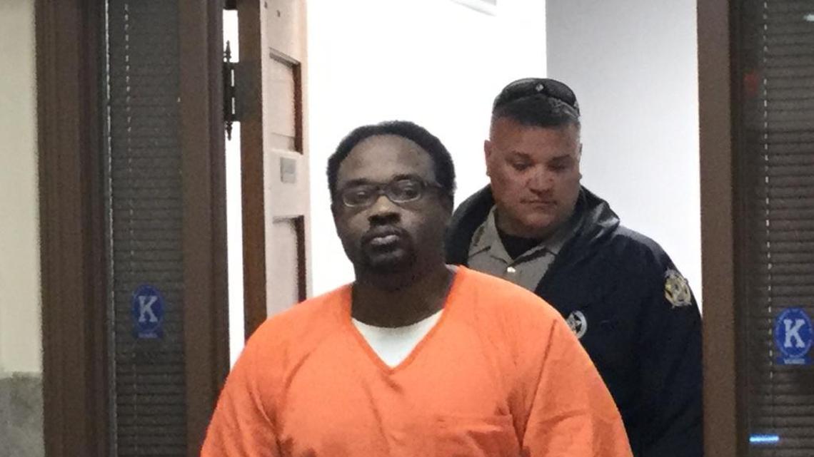 Ronald Exantus, accused of murder in the 2015 stabbing death of 6-year-old Logan James Dean Tipton in Versailles, was escorted from the Woodford County Courthouse on Wednesday after appearing before Special Judge Jeffrey Walson.