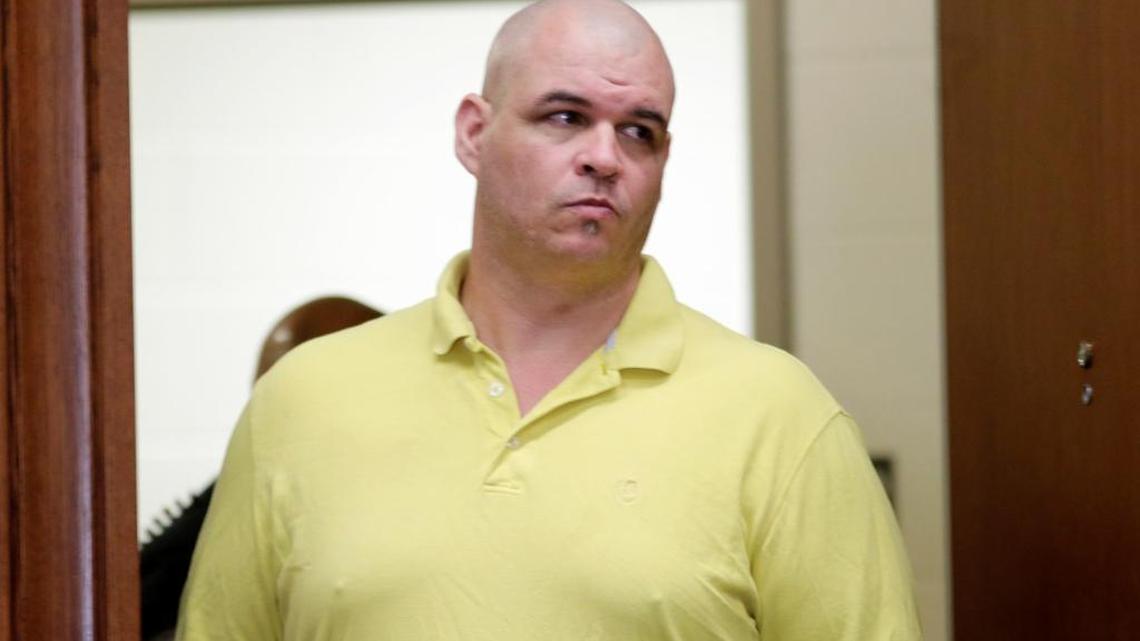 Timothy "Tiny" Ballard was led into the courtroom on June 9, 2016, to testify against Robert Markham Taylor in Taylor’s murder trial for the December 2013 slaying of Alex Johnson.