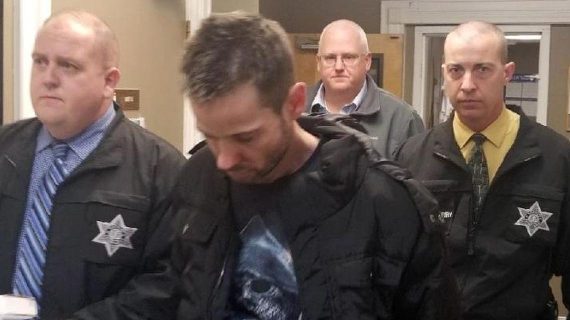 Joshua Tate Davenport, accused in the shooting death of his wife, is escorted to the Laurel County Detention Center by detectives with the Laurel County Sheriff’s Office.