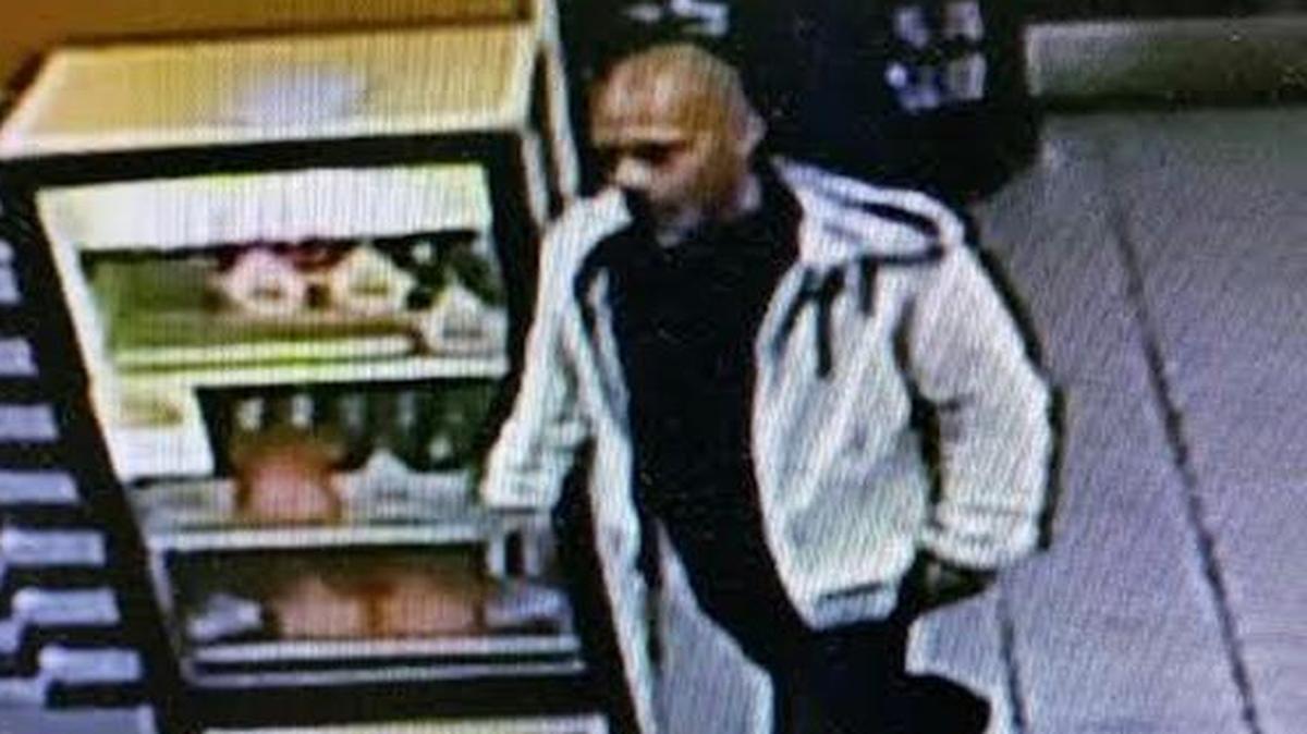A photo from security footage taken during robbery of Marathon gas station on North Broadway. Police looked for the suspect Friday.